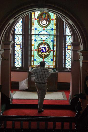 Duntryleague_fullwin.jpg - David's picture of Michael photographing the Dalton Window at Duntryleague (DP)