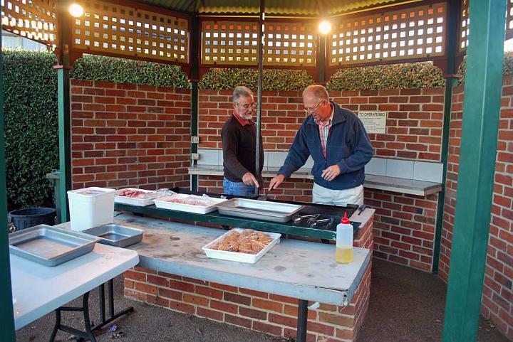 dp_sun_DuntryBBQ3.jpg - John and Gavin dividing up the BBQ tasks (DP)
